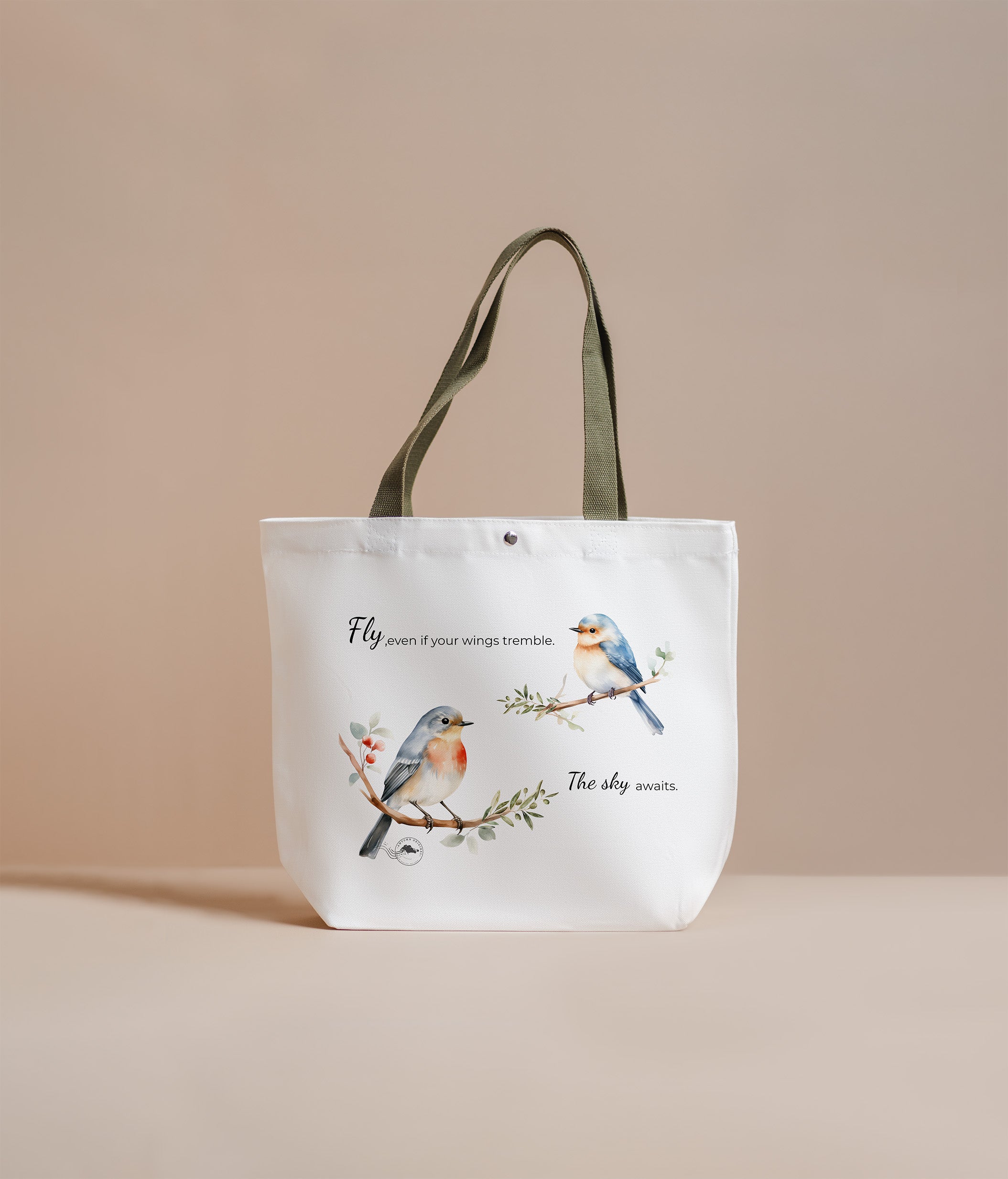 Tote bag with bird illustrations and text on a beige background