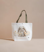 Tote bag with a rabbit design on a beige background