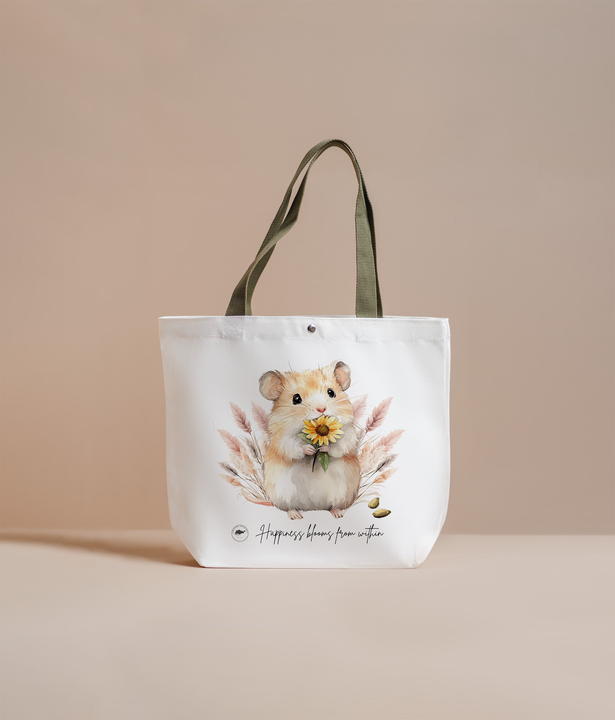 Tote bag with a hamster design and text on a beige background