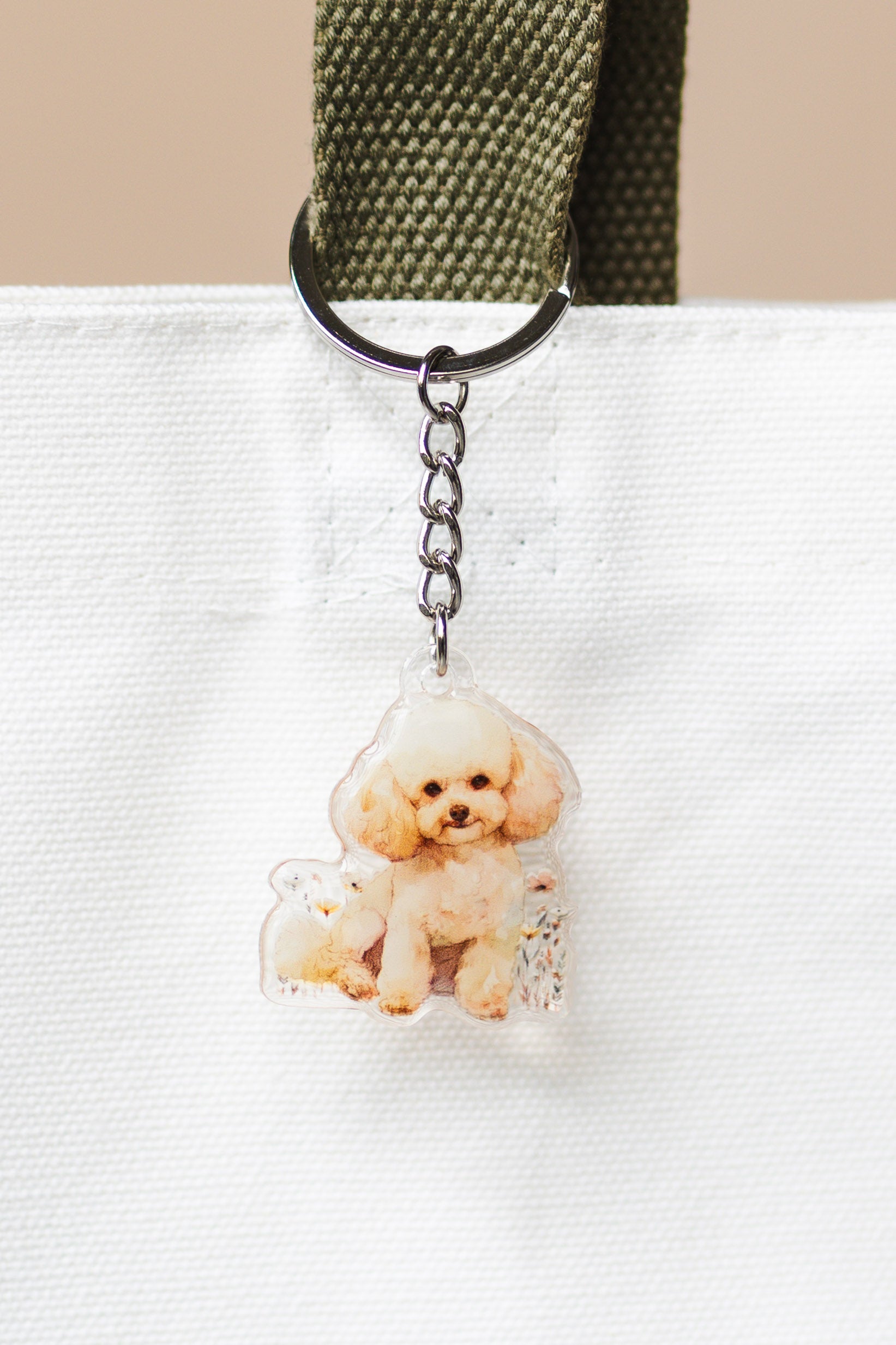 Poodle Dog Acrylic Keychain | Epoxy Coated on a white background