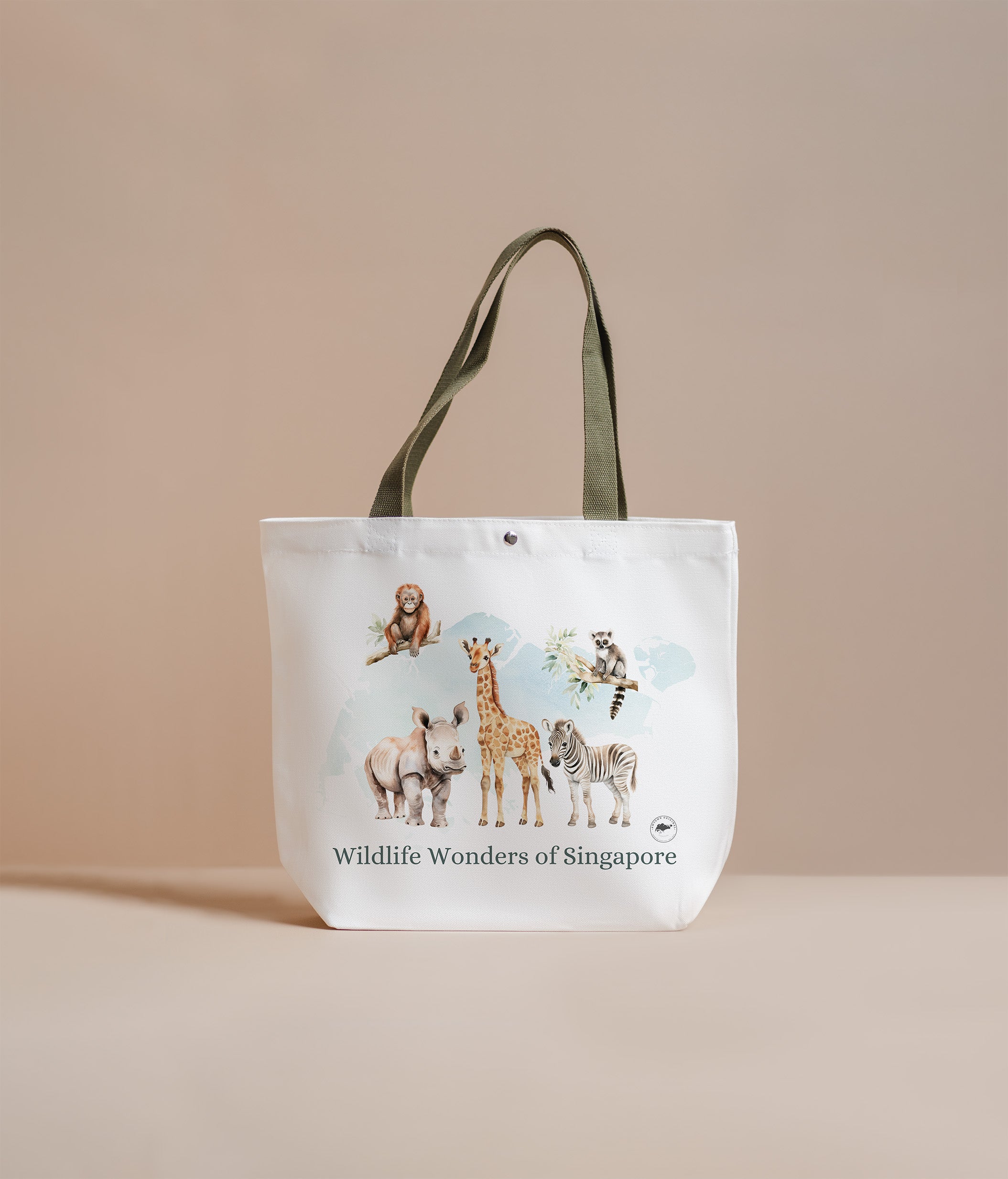 Tote bag with illustrations of animals and 'Wildlife Wonders of Singapore' text on a beige background