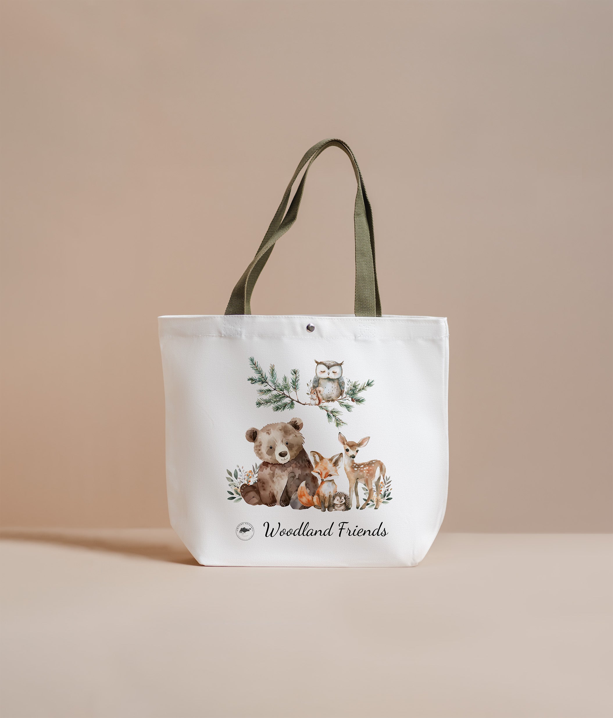 Tote bag with woodland animal illustrations on a beige background