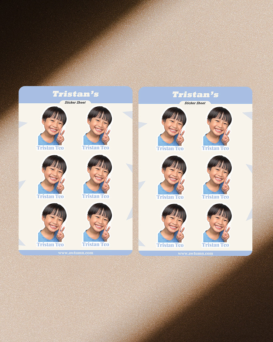 Two sticket sheet with a child's photo and name on a textured surface