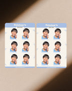 Two sticket sheet with a child's photo and name on a textured surface